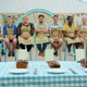GBBO contestants seated in a row